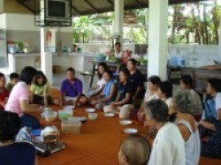 Cancer patients listening to a talk about making vegetarian food