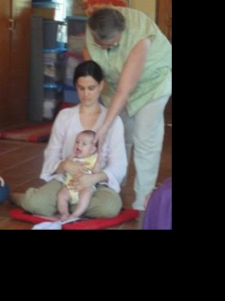 Graziella and baby daughter receiving a Reiki attunement